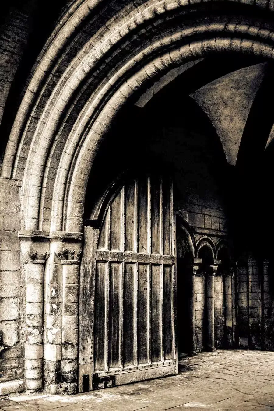 An old arch with the gates ajar