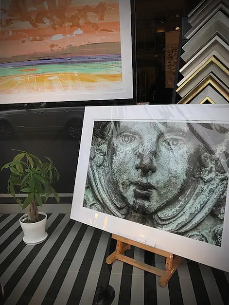 Framed photo inside a display window